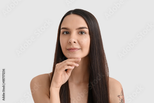 Beautiful young woman with ...