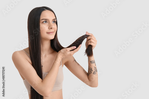 Beautiful young woman with ...