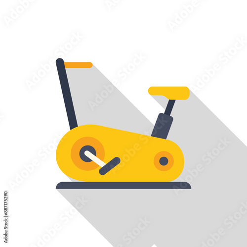Yellow stationary bike providing indoor exercise with long shadow