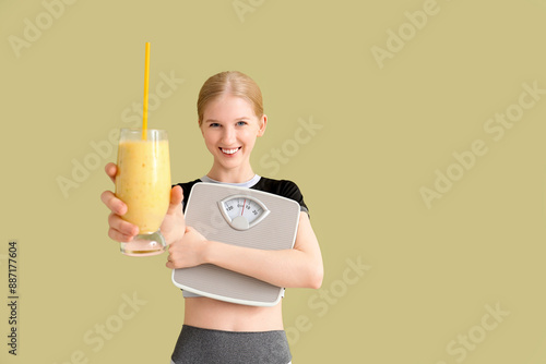 Happy sporty young woman wi...