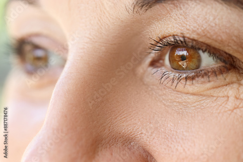 Mature woman with brown eye...