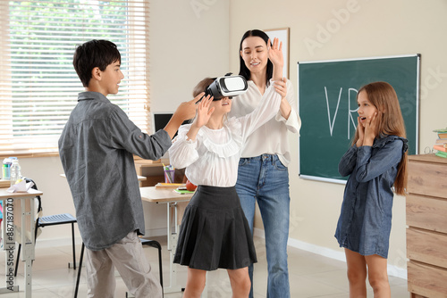Teenage girl using VR glass...