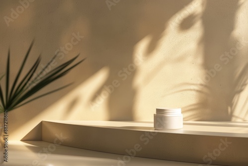 Wallpaper Mural A white jar sits on a cream-colored shelf, illuminated by sunlight casting leafy shadows on the wall behind it, copy space Torontodigital.ca
