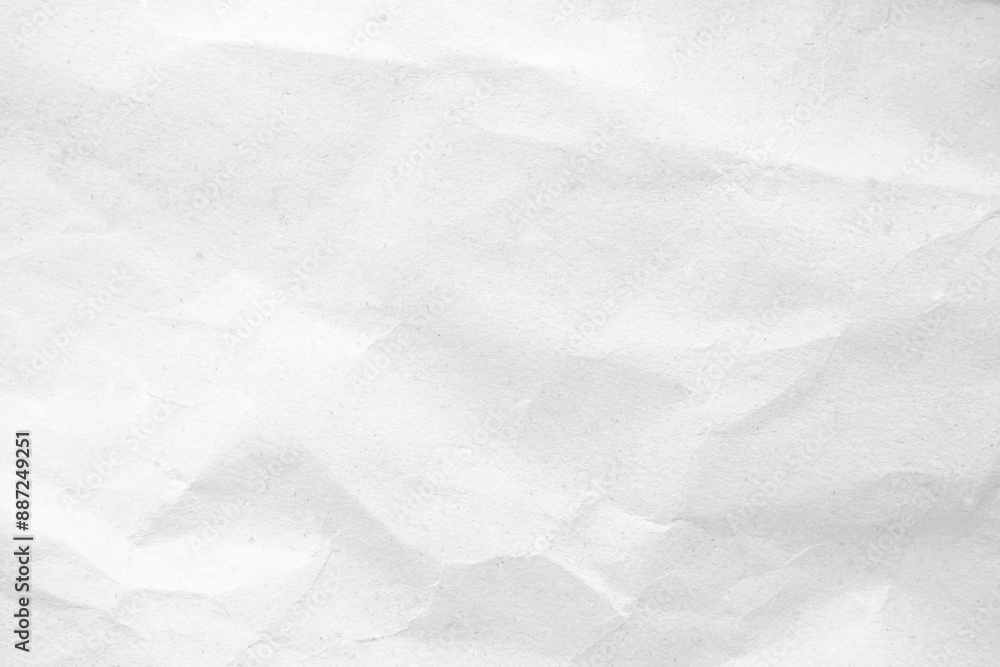 Fototapeta premium Crumpled white paper texture or background for design with copy space for text or image.