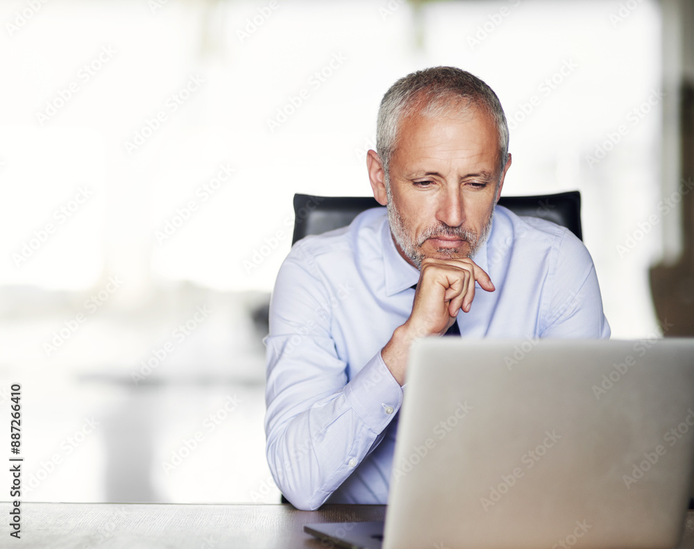 Thinking, reading and mature businessman in office with laptop for stock market news, results or checking feedback. Problem solving, idea and broker online with pc for investment, deal or research Thinking, reading and mature businessman in office with laptop for stock market news, results or checking feedback. Problem solving, idea and broker online with pc for investment, deal or research
