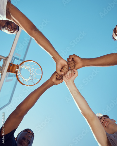 Fototapeta Naklejka Na Ścianę i Meble -  Diversity and hands of basketball sports teamwork in solidarity and collaboration to win game at basketball court. Motivation, fitness and healthy athlete men or tournament training group of people