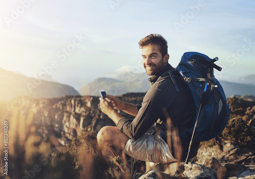 Portrait, hiking and man on mountain with phone for geology career with digital nomad for travel. Nature, backpack and petrologist trekking with cellphone for environmental research in Australia.
