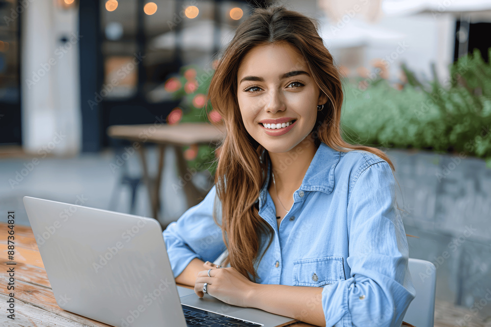 Smiling Young Businesswoman with Laptop on Video Call Sitting Outside Office Smiling Young Businesswoman with Laptop on Video Call Sitting Outside Office