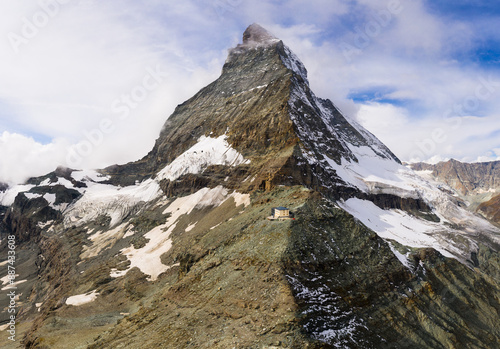 Zermatt, Switzerland: Dramatic aerial view of the famous Matterhorn, or Cervin, mountain peak from Zermatt in the alps in Valais, Switzerland. photo