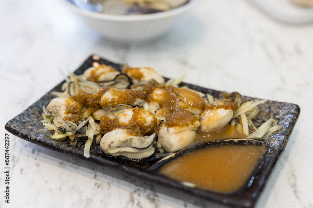 Cooked oyster with garlic sauce Cooked oyster with garlic sauce