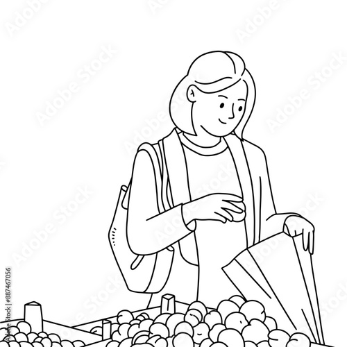 Young woman buying some fruit in the market