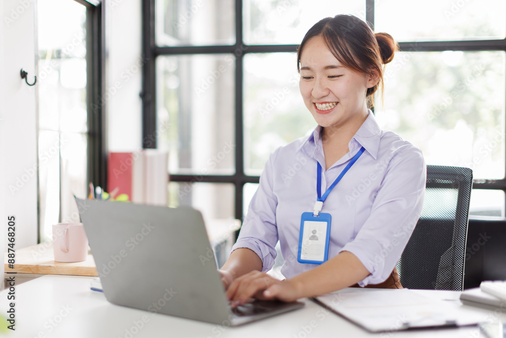 Young attractive businessasian woman executive working on financial strategy her project with laptop computer technology in modern office room. Young attractive businessasian woman executive working on financial strategy her project with laptop computer technology in modern office room.