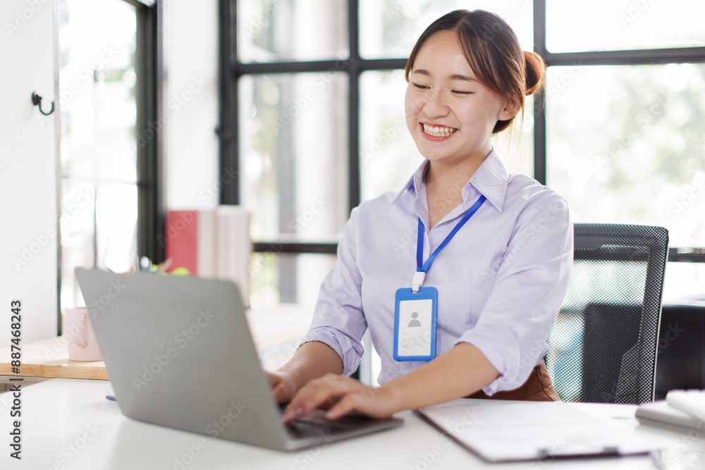 Young attractive businessasian woman executive working on financial strategy her project with laptop computer technology in modern office room. Young attractive businessasian woman executive working on financial strategy her project with laptop computer technology in modern office room.