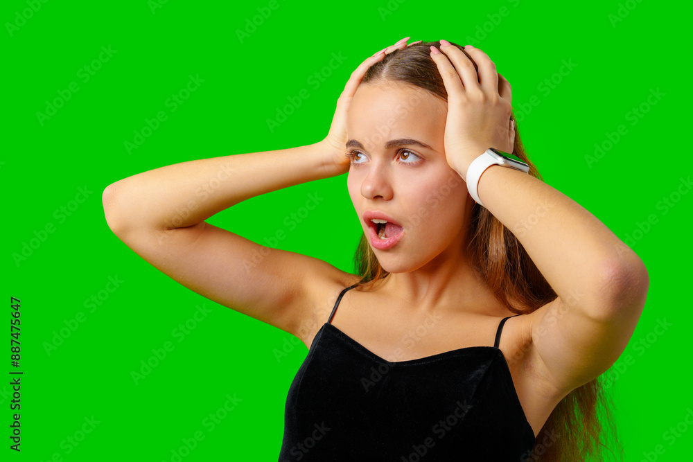 Young Woman Making a Surprised Face in Front of Green Screen Young Woman Making a Surprised Face in Front of Green Screen