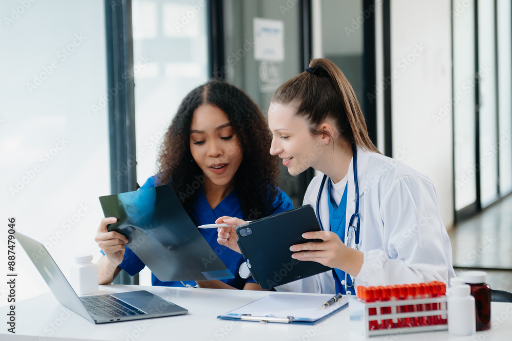 Modern Medical Research Laboratory Portrait of Two African American Scientists Working, Using Digital Tablet, Analyzing Samples, Talking. Modern Medical Research Laboratory Portrait of Two African American Scientists Working, Using Digital Tablet, Analyzing Samples, Talking.