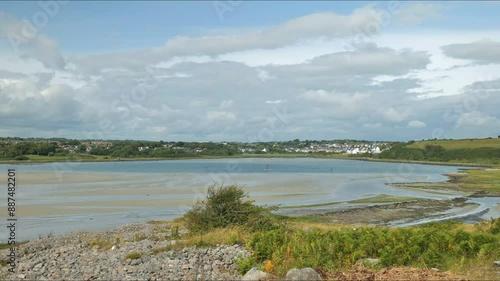 Windsurfing 4k timelapse at Rusheen bay, sandy scenic beach at Galway, Ireland, nature background photo