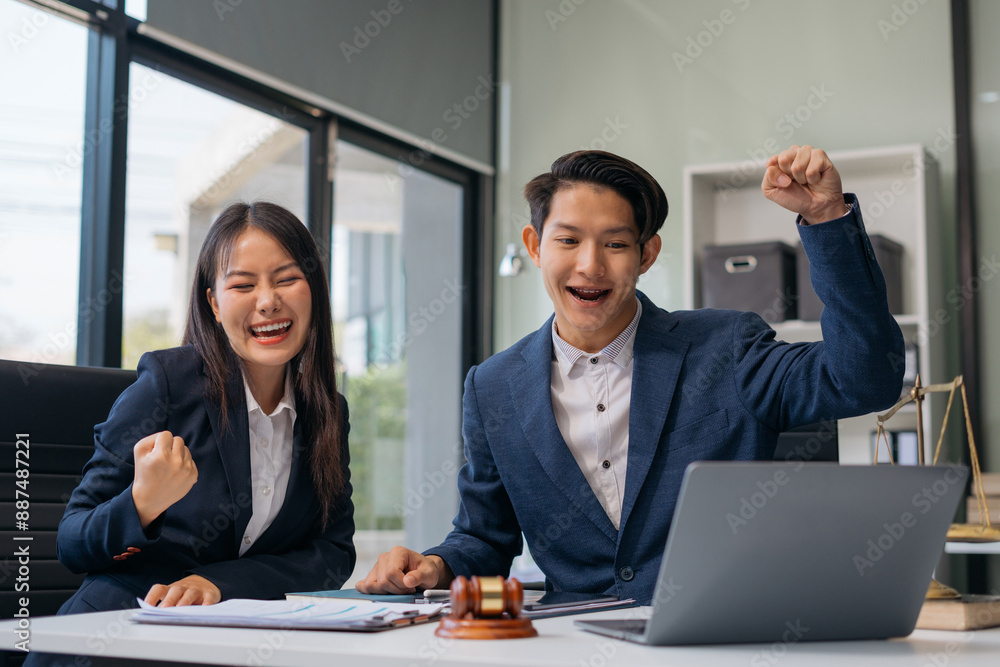 Happy smiling Lawyer feel happy work complete Teamwork success, success after discussing a contract agreement done. Happy smiling Lawyer feel happy work complete Teamwork success, success after discussing a contract agreement done.