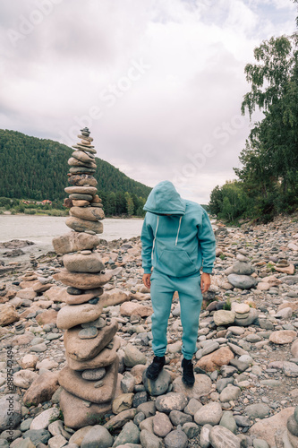 Man at the river Katun at s...