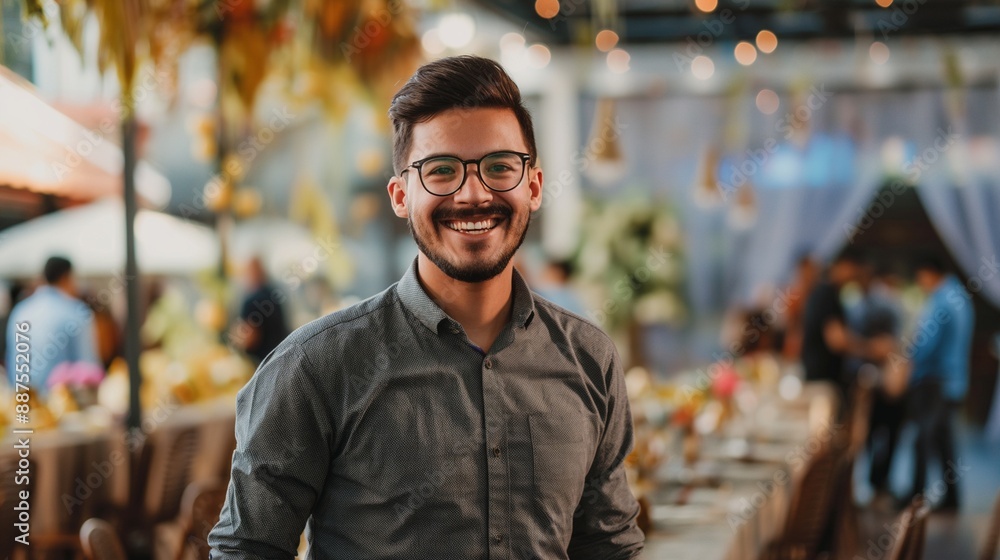 Male Event Coordinator with Confident Smile Wearing Neat Clothes Posing at Decorated Venue Demonstrating Expertise in Event Planning and Organization from Waist Up Male Event Coordinator with Confident Smile Wearing Neat Clothes Posing at Decorated Venue Demonstrating Expertise in Event Planning and Organization from Waist Up