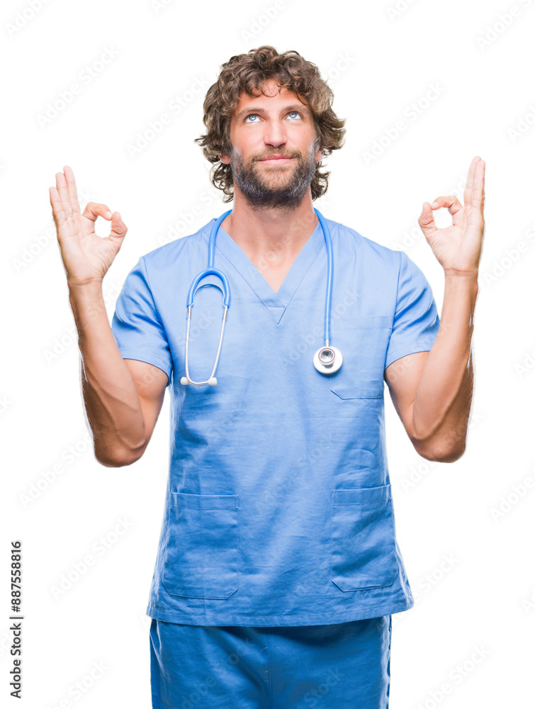 Handsome hispanic surgeon doctor man over isolated background relax and smiling with eyes closed doing meditation gesture with fingers. Yoga concept. Handsome hispanic surgeon doctor man over isolated background relax and smiling with eyes closed doing meditation gesture with fingers. Yoga concept.