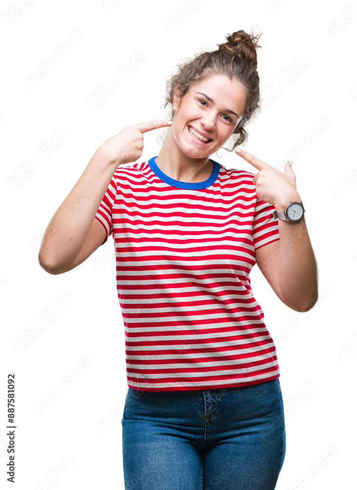 Beautiful brunette curly hair young girl wearing casual look over isolated background smiling confident showing and pointing with fingers teeth and mouth. Health concept. Beautiful brunette curly hair young girl wearing casual look over isolated background smiling confident showing and pointing with fingers teeth and mouth. Health concept.