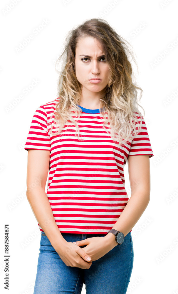 Beautiful young blonde woman over isolated background depressed and worry for distress, crying angry and afraid. Sad expression. Beautiful young blonde woman over isolated background depressed and worry for distress, crying angry and afraid. Sad expression.