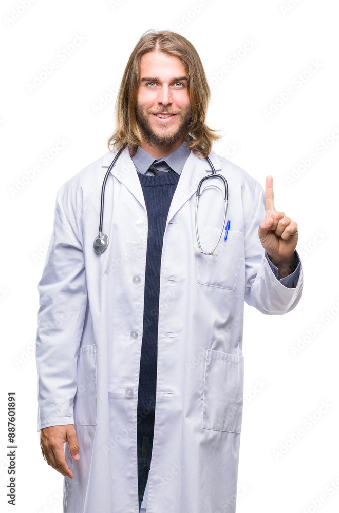 Young handsome doctor man with long hair over isolated background showing and pointing up with finger number one while smiling confident and happy. Young handsome doctor man with long hair over isolated background showing and pointing up with finger number one while smiling confident and happy.