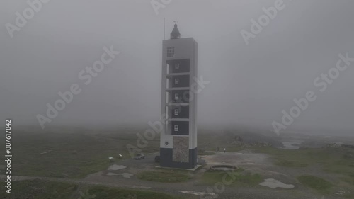 Faro Punta de Frouxeira de Valdoviño en un dia muy nublado photo