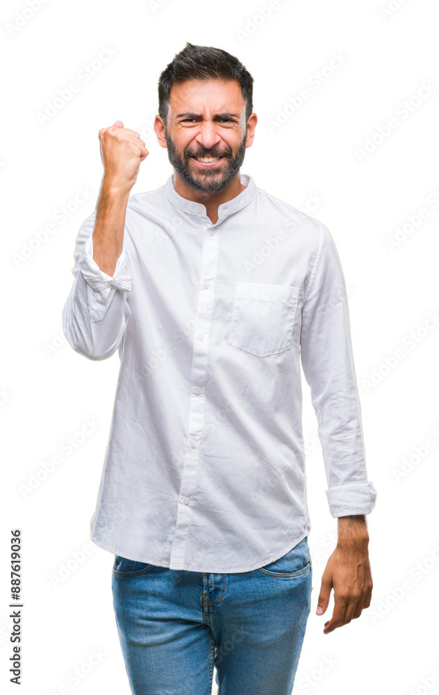 Adult hispanic man over isolated background angry and mad raising fist frustrated and furious while shouting with anger. Rage and aggressive concept. Adult hispanic man over isolated background angry and mad raising fist frustrated and furious while shouting with anger. Rage and aggressive concept.