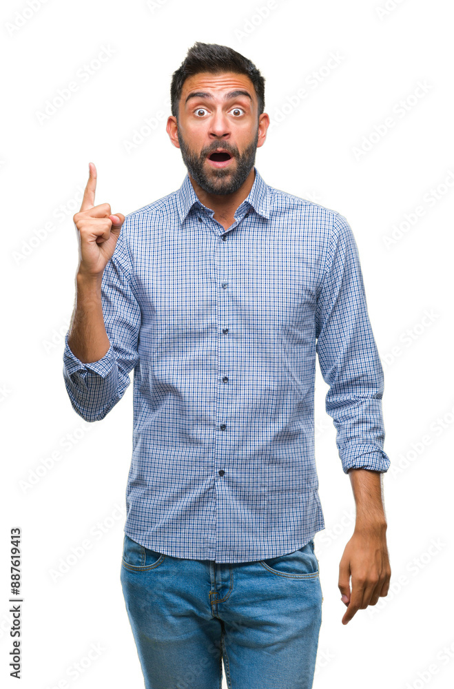 Adult hispanic man over isolated background pointing finger up with successful idea. Exited and happy. Number one. Adult hispanic man over isolated background pointing finger up with successful idea. Exited and happy. Number one.