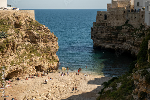 People Enjoying the Polignano a Mare Beach, Puglia, Italy photo