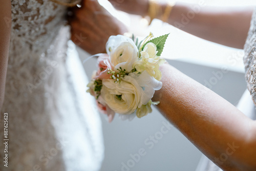 Wall Mural wedding preparation with bride, featuring wrist corsage