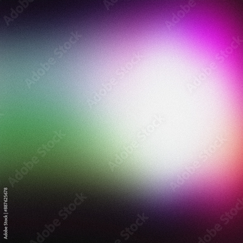 Abstract background with a grainy texture fading from green to purple