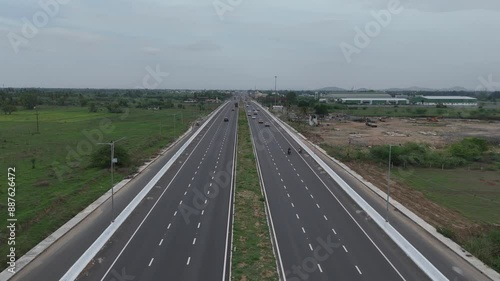 Elevated footage of the highway during a cloudy cilmate. photo