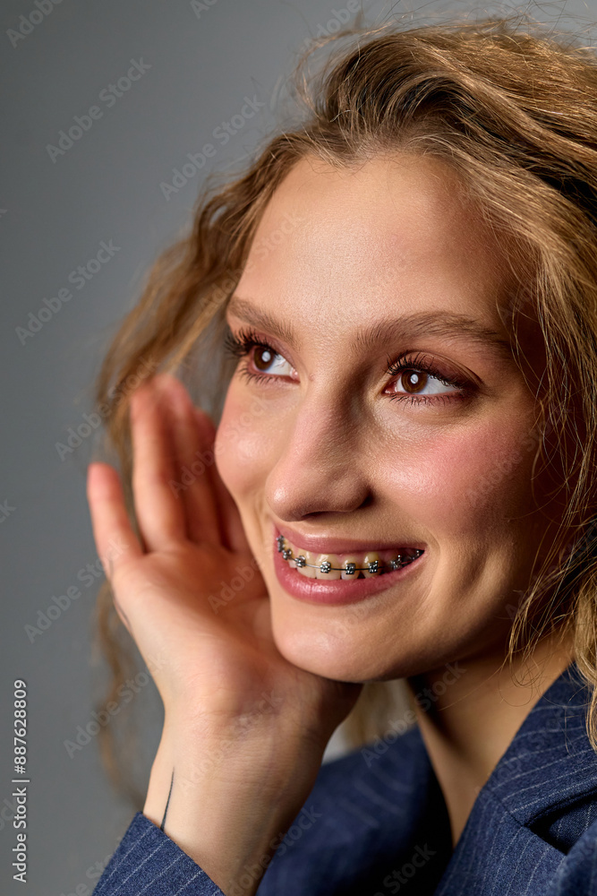 Smiling Woman With Braces in the studio Smiling Woman With Braces in the studio