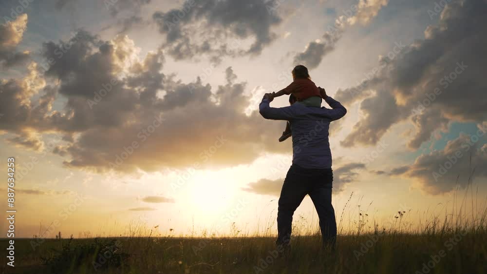 Father with child in park at sunset. family moments in park. Silhouette father carrying child on shoulders. Emotional family bonding park. Scenic park view with father and child. Family time together. Father with child in park at sunset. family moments in park. Silhouette father carrying child on shoulders. Emotional family bonding park. Scenic park view with father and child. Family time together.
