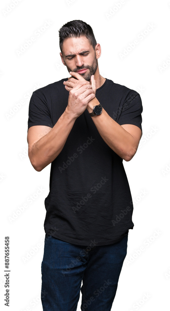 Young handsome man over isolated background Suffering pain on hands and fingers, arthritis inflammation Young handsome man over isolated background Suffering pain on hands and fingers, arthritis inflammation
