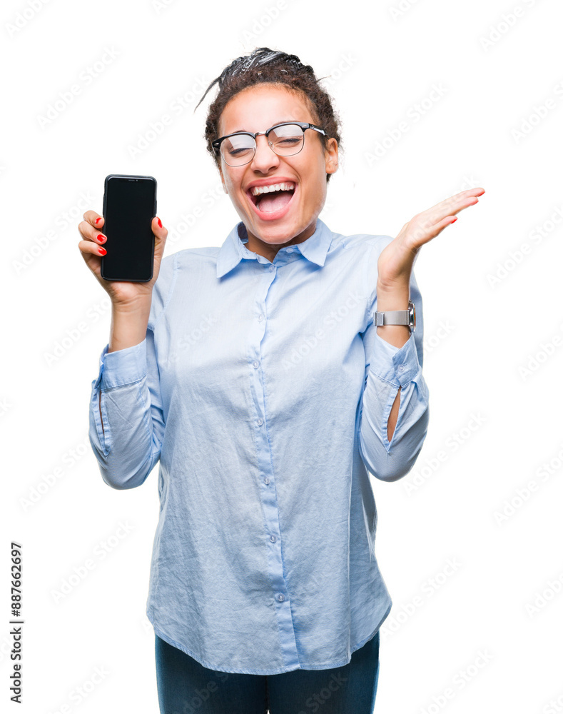 Young braided hair african american business girl showing screen of smartphone over isolated background very happy and excited, winner expression celebrating victory screaming with big smile Young braided hair african american business girl showing screen of smartphone over isolated background very happy and excited, winner expression celebrating victory screaming with big smile
