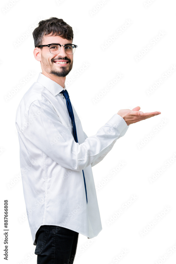 Young handsome business man wearing glasses over isolated background Pointing to the side with hand and open palm, presenting ad smiling happy and confident Young handsome business man wearing glasses over isolated background Pointing to the side with hand and open palm, presenting ad smiling happy and confident