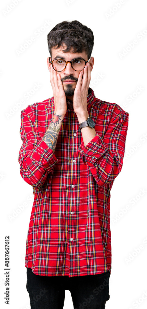 Young handsome man wearing glasses over isolated background Tired hands covering face, depression and sadness, upset and irritated for problem Young handsome man wearing glasses over isolated background Tired hands covering face, depression and sadness, upset and irritated for problem