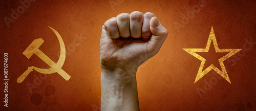 Fotografi Fist of a protester against the background of the Soviet flag