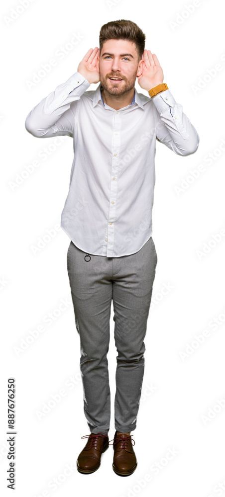 Young handsome business man Trying to hear both hands on ear gesture, curious for gossip. Hearing problem, deaf Young handsome business man Trying to hear both hands on ear gesture, curious for gossip. Hearing problem, deaf