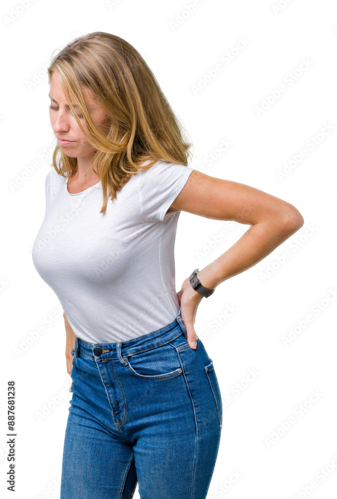 Beautiful young woman wearing casual white t-shirt over isolated background Suffering of backache, touching back with hand, muscular pain Beautiful young woman wearing casual white t-shirt over isolated background Suffering of backache, touching back with hand, muscular pain