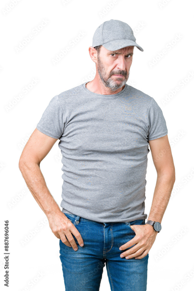 Handsome middle age hoary senior man wearing sport cap over isolated background skeptic and nervous, frowning upset because of problem. Negative person. Handsome middle age hoary senior man wearing sport cap over isolated background skeptic and nervous, frowning upset because of problem. Negative person.