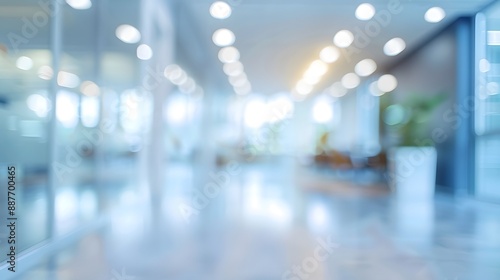 A perspective shot of an office corridor in soft focus, emphasizing the modern, innovative architecture. The shallow depth of field accentuates modern interior design.