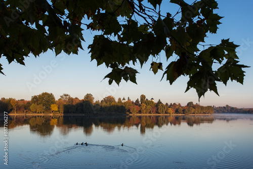 Obraz na płótnie Beautiful landscape in a park in autumn season with lake in background and colourful leafs w salonie
