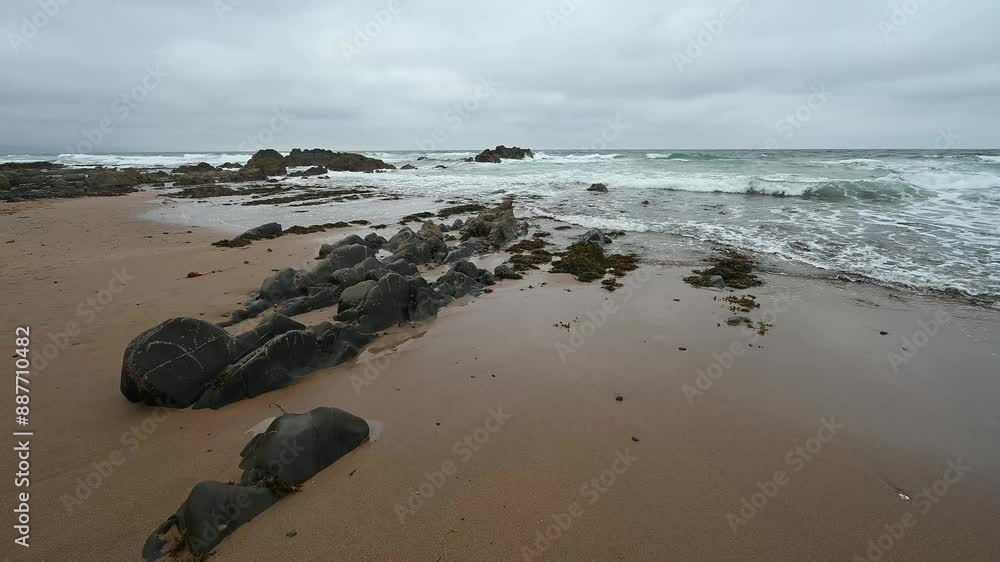 San rocks and surf on Sandymouth Beach Cornwall San rocks and surf on Sandymouth Beach Cornwall
