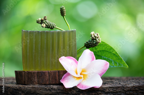 Take extracts from Wildbetal leafbush to make glycerin soap on natural background. photo