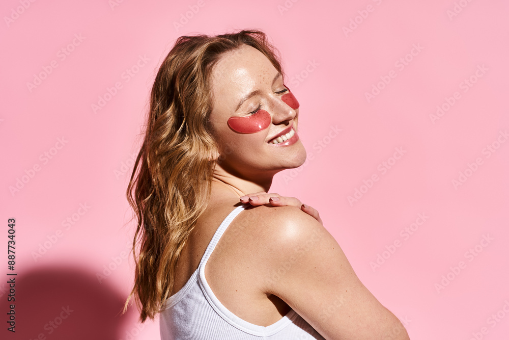 A natural beauty posing confidently with eye patches. A natural beauty posing confidently with eye patches.