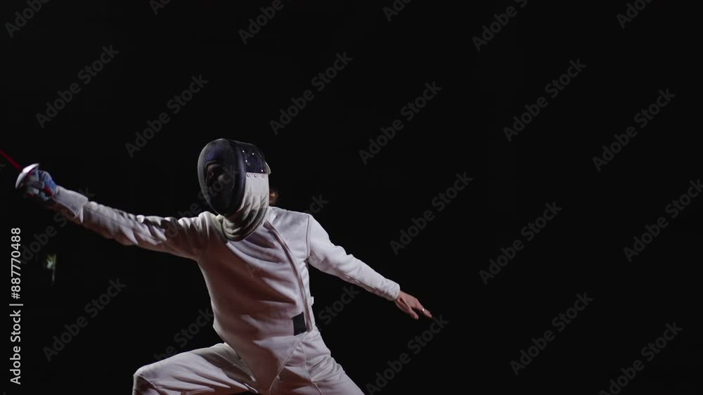 Figure Of Male Fencer In White Sportswear And Fencing Mask Practicing In Darkness, Portrait Figure Of Male Fencer In White Sportswear And Fencing Mask Practicing In Darkness, Portrait